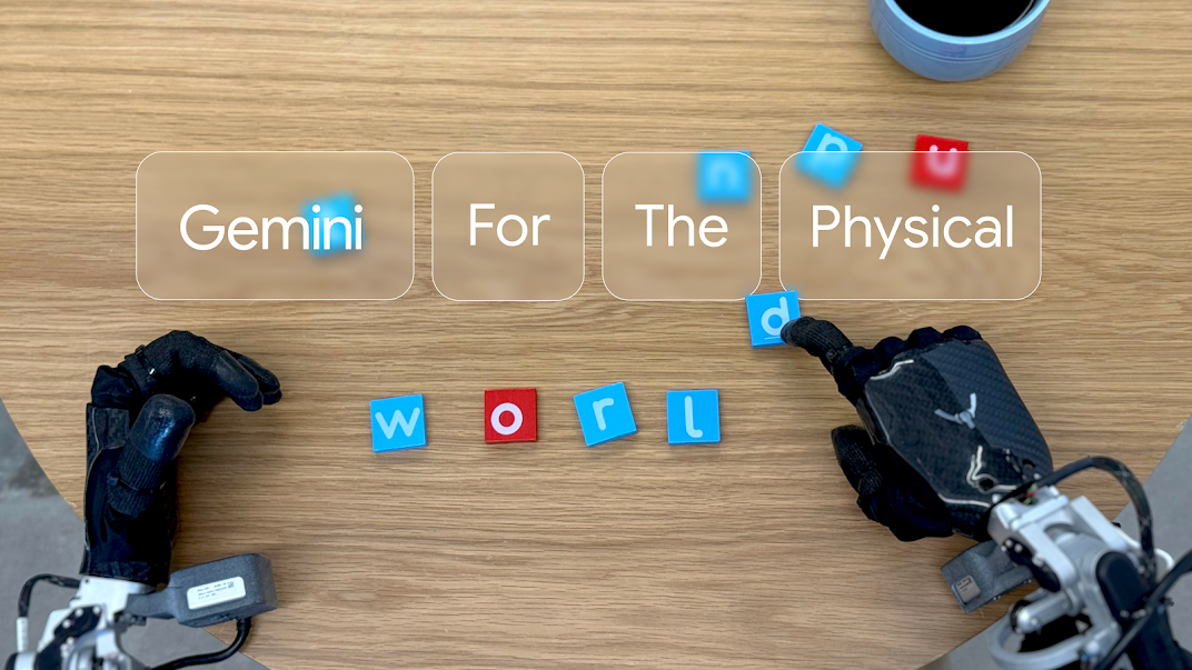 Hands from the Robot’s POV. A pair of robotic hands move tiles into the word ‘world’ under the text ‘Gemini for the Physical’.